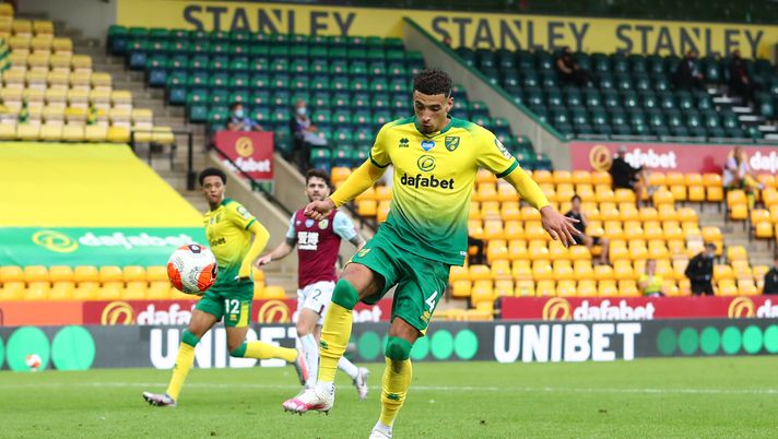 NORWICH, ENGLAND - JULY 18: Ben Godfrey of Norwich City scores an own goal, Burnley's second goal during the Premier League match between Norwich City and Burnley FC at Carrow Road on July 18, 2020 in Norwich, England. Football Stadiums around Europe remain empty due to the Coronavirus Pandemic as Government social distancing laws prohibit fans inside venues resulting in all fixtures being played behind closed doors. (Photo by Julian Finney/Getty Images) NORWICH, ENGLAND - JULY 18: Ben Godfrey of Norwich City scores an own goal, Burnley's second goal during the Premier League match between Norwich City and Burnley FC at Carrow Road on July 18, 2020 in Norwich, England. Football Stadiums around Europe remain empty due to the Coronavirus Pandemic as Government social distancing laws prohibit fans inside venues resulting in all fixtures being played behind closed doors. (Photo by Julian Finney/Getty Images)