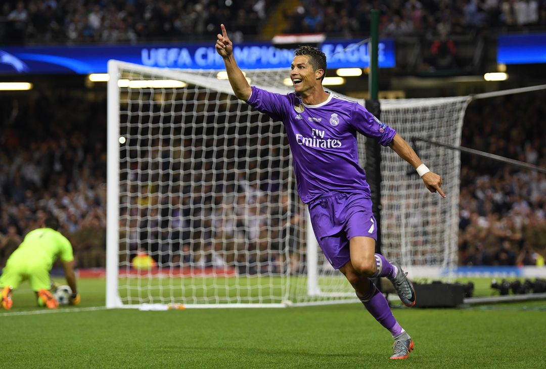  CARDIFF, WALES - JUNE 03: Cristiano Ronaldo of Real Madrid celebrates scoring his sides third goal during the UEFA Champions League Final between Juventus and Real Madrid at National Stadium of Wales on June 3, 2017 in Cardiff, Wales.  (Photo by Matthias Hangst/Getty Images) 