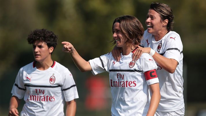 MILAN, ITALY - SEPTEMBER 30: Daniela Sabatino (C) of AC Milan celebrates her second goal with team-mate Valentina Giacinti (R) during the Serie A match between AC Milan Women and Fiorentina Women at Campo Sportivo Vismara on September 30, 2018 in Milan, Italy. (Photo by Emilio Andreoli/Getty Images) MILAN, ITALY - SEPTEMBER 30: Daniela Sabatino (C) of AC Milan celebrates her second goal with team-mate Valentina Giacinti (R) during the Serie A match between AC Milan Women and Fiorentina Women at Campo Sportivo Vismara on September 30, 2018 in Milan, Italy. (Photo by Emilio Andreoli/Getty Images)