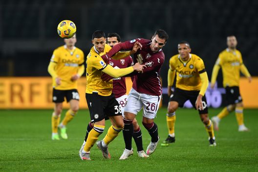 TURIN, ITALY - DECEMBER 12: Rolando Mandragora of Udinese Calcio and Federico Bonazzoli of Torino F.C. battle for the ball during the Serie A match between Torino FC and Udinese Calcio at Stadio Olimpico di Torino on December 12, 2020 in Turin, Italy. Sporting stadiums around Italy remain under strict restrictions due to the Coronavirus Pandemic as Government social distancing laws prohibit fans inside venues resulting in games being played behind closed doors. (Photo by Valerio Pennicino/Getty Images) TURIN, ITALY - DECEMBER 12: Rolando Mandragora of Udinese Calcio and Federico Bonazzoli of Torino F.C. battle for the ball during the Serie A match between Torino FC and Udinese Calcio at Stadio Olimpico di Torino on December 12, 2020 in Turin, Italy. Sporting stadiums around Italy remain under strict restrictions due to the Coronavirus Pandemic as Government social distancing laws prohibit fans inside venues resulting in games being played behind closed doors. (Photo by Valerio Pennicino/Getty Images)