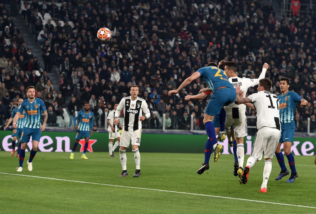  TURIN, ITALY - MARCH 12: Cristiano Ronaldo of Juventus scores his second goal during the UEFA Champions League Round of 16 Second Leg match between Juventus and Club de Atletico Madrid at Allianz Stadium on March 12, 2019 in Turin, Italy. (Photo by Tullio M. Puglia/Getty Images) 