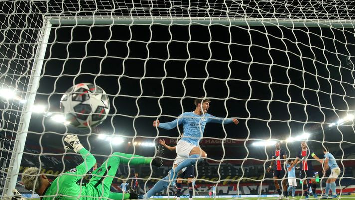 PARIS, FRANCE - APRIL 28: John Stones of Manchester City celebrates their side's first goal scored by Kevin De Bruyne of Manchester City (not pictured) as Keylor Navas of Paris Saint-Germain looks dejected during the UEFA Champions League Semi Final First Leg match between Paris Saint-Germain and Manchester City at Parc des Princes on April 28, 2021 in Paris, France. Sporting stadiums around France remain under strict restrictions due to the Coronavirus Pandemic as Government social distancing laws prohibit fans inside venues resulting in games being played behind closed doors. (Photo by Alex Grimm/Getty Images) PARIS, FRANCE - APRIL 28: John Stones of Manchester City celebrates their side's first goal scored by Kevin De Bruyne of Manchester City (not pictured) as Keylor Navas of Paris Saint-Germain looks dejected during the UEFA Champions League Semi Final First Leg match between Paris Saint-Germain and Manchester City at Parc des Princes on April 28, 2021 in Paris, France. Sporting stadiums around France remain under strict restrictions due to the Coronavirus Pandemic as Government social distancing laws prohibit fans inside venues resulting in games being played behind closed doors. (Photo by Alex Grimm/Getty Images)