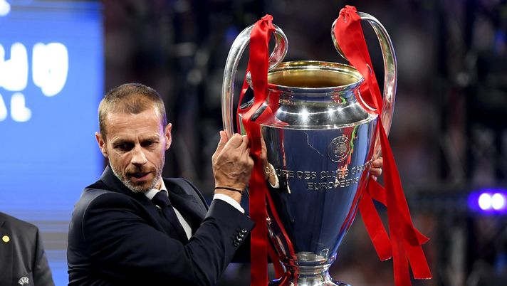 MADRID, SPAIN - JUNE 01: Aleksander Ceferin UEFA president picks up the Champions league trophy in preparation to presenting it to Liverpool during the UEFA Champions League Final between Tottenham Hotspur and Liverpool at Estadio Wanda Metropolitano on June 01, 2019 in Madrid, Spain. (Photo by Matthias Hangst/Getty Images) MADRID, SPAIN - JUNE 01: Aleksander Ceferin UEFA president picks up the Champions league trophy in preparation to presenting it to Liverpool during the UEFA Champions League Final between Tottenham Hotspur and Liverpool at Estadio Wanda Metropolitano on June 01, 2019 in Madrid, Spain. (Photo by Matthias Hangst/Getty Images)