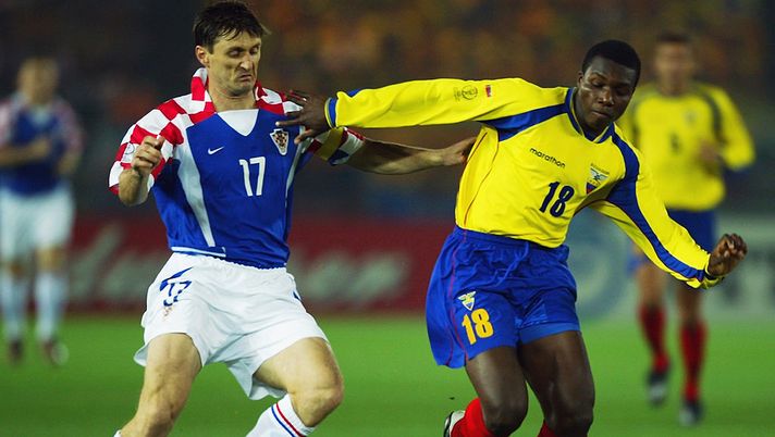YOKOHAMA - JUNE 13: Carlos Tenorio of Ecuador takes the ball past Robert Jarni of Croatia during the FIFA World Cup Finals 2002 Group G match played at the International Stadium Yokohama, in Yokohama, Japan on June 13, 2002. Ecuador won the match 1-0. DIGITAL IMAGE. (Photo by Alex Livesey/Getty Images) YOKOHAMA - JUNE 13: Carlos Tenorio of Ecuador takes the ball past Robert Jarni of Croatia during the FIFA World Cup Finals 2002 Group G match played at the International Stadium Yokohama, in Yokohama, Japan on June 13, 2002. Ecuador won the match 1-0. DIGITAL IMAGE. (Photo by Alex Livesey/Getty Images)