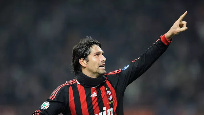 MILAN, ITALY - OCTOBER 31:  Marco Borriello of AC Milan celebrates after scoring the second goal during the Serie A match between AC Milan and Parma FC at the Stadio Giuseppe Meazza on October 31, 2009 in Milan, Italy.  (Photo by Claudio Villa/Getty Images)