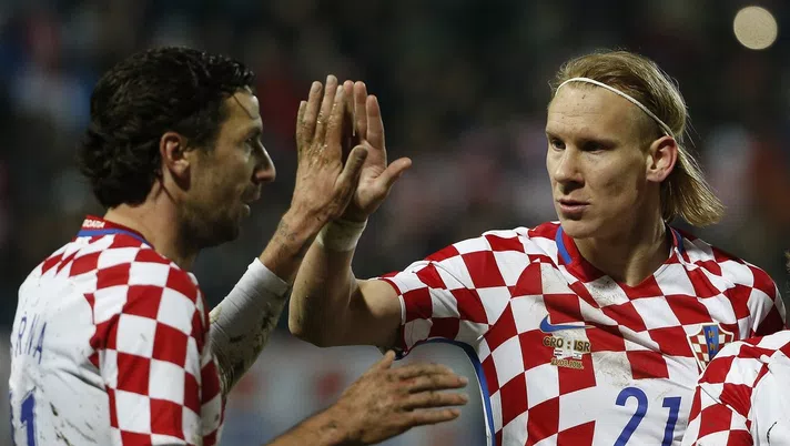 OSIJEK, CROATIA - MARCH 23: Domagoj Vida (R) celebrates with the Dario Srna (L) of Croatia  during the International Friendly match between Croatia and Israel at stadium Gradski Vrt on March 23, 2016 in Osijek, Croatia. (Photo by Srdjan Stevanovic/Getty Images)