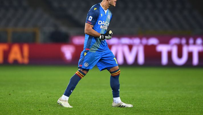 TURIN, ITALY - DECEMBER 12: Juan Musso of Udinese Calcio celebrates after the Serie A match between Torino FC and Udinese Calcio at Stadio Olimpico di Torino on December 12, 2020 in Turin, Italy. Sporting stadiums around Italy remain under strict restrictions due to the Coronavirus Pandemic as Government social distancing laws prohibit fans inside venues resulting in games being played behind closed doors. (Photo by Valerio Pennicino/Getty Images) TURIN, ITALY - DECEMBER 12: Juan Musso of Udinese Calcio celebrates after the Serie A match between Torino FC and Udinese Calcio at Stadio Olimpico di Torino on December 12, 2020 in Turin, Italy. Sporting stadiums around Italy remain under strict restrictions due to the Coronavirus Pandemic as Government social distancing laws prohibit fans inside venues resulting in games being played behind closed doors. (Photo by Valerio Pennicino/Getty Images)