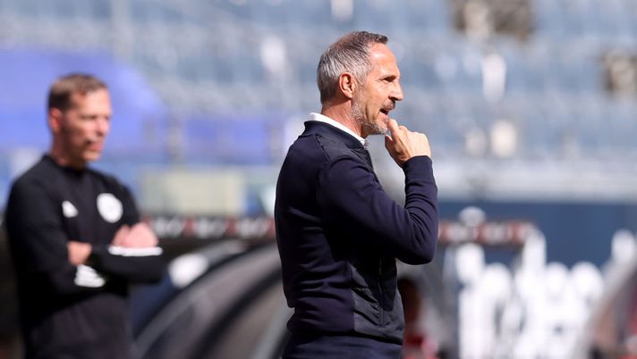 FRANKFURT AM MAIN, GERMANY - MAY 22: Adi Huetter, Head Coach of Eintracht Frankfurt looks on during the Bundesliga match between Eintracht Frankfurt and Sport-Club Freiburg at Deutsche Bank Park on May 22, 2021 in Frankfurt am Main, Germany. Sporting stadiums around Germany remain under strict restrictions due to the Coronavirus Pandemic as Government social distancing laws prohibit fans inside venues resulting in games being played behind closed doors. (Photo by Alex Grimm/Getty Images) FRANKFURT AM MAIN, GERMANY - MAY 22: Adi Huetter, Head Coach of Eintracht Frankfurt looks on during the Bundesliga match between Eintracht Frankfurt and Sport-Club Freiburg at Deutsche Bank Park on May 22, 2021 in Frankfurt am Main, Germany. Sporting stadiums around Germany remain under strict restrictions due to the Coronavirus Pandemic as Government social distancing laws prohibit fans inside venues resulting in games being played behind closed doors. (Photo by Alex Grimm/Getty Images)
