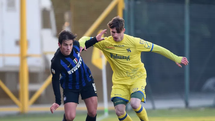 SESTO SAN GIOVANNI, ITALY - DECEMBER 15:  (L) Elian Demirovic of FC Internazionale U19 competes for the ball with player of Chievo Verona player during the Serie A Primavera match between FC Internazionale U19 and Chievo Verona at Stadio Breda on December 15, 2018 in Sesto San Giovanni, Italy.  (Photo by Pier Marco Tacca - Inter/Inter via Getty Images)