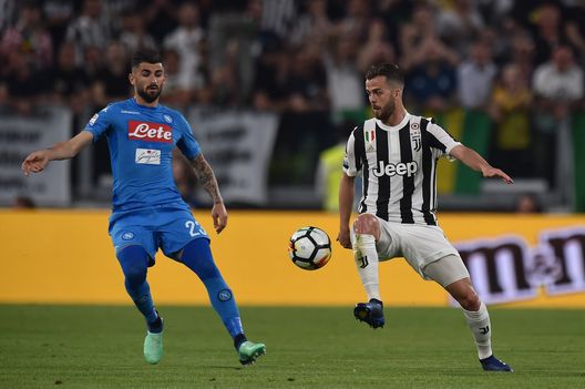 TURIN, ITALY - APRIL 22: Miralem Pjanic of Juventus competes for the ball with Elseid Hysaj of SSC Napoli during the serie A match between Juventus and SSC Napoli on April 22, 2018 in Turin, Italy. (Photo by Tullio Puglia - Juventus/Juventus FC via Getty Images) TURIN, ITALY - APRIL 22: Miralem Pjanic of Juventus competes for the ball with Elseid Hysaj of SSC Napoli during the serie A match between Juventus and SSC Napoli on April 22, 2018 in Turin, Italy. (Photo by Tullio Puglia - Juventus/Juventus FC via Getty Images)