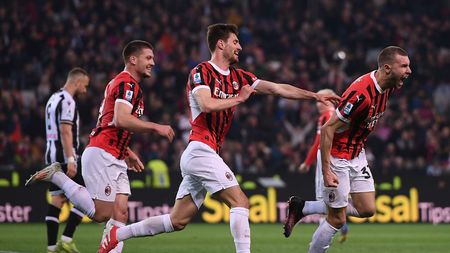 UDINE, ITALY - APRIL 11: Strahinja Pavlović of AC Milan celebrates after scoring the opening goal during the Serie A match between Udinese and AC Milan at Stadio Friuli on April 11, 2025 in Udine, Italy. (Photo by Alessandro Sabattini/Getty Images)