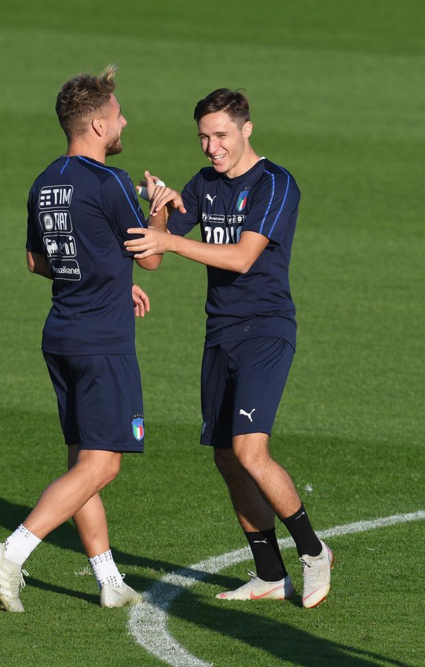FLORENCE, ITALY - OCTOBER 08: Federico Chiesa (R) and Ciro Immobile of Italy in action during a Italy training session at Centro Tecnico Federale di Coverciano on October 8, 2018 in Florence, Italy. (Photo by Claudio Villa/Getty Images) FLORENCE, ITALY - OCTOBER 08: Federico Chiesa (R) and Ciro Immobile of Italy in action during a Italy training session at Centro Tecnico Federale di Coverciano on October 8, 2018 in Florence, Italy. (Photo by Claudio Villa/Getty Images)