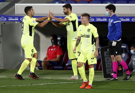 HUESCA, SPAIN - SEPTEMBER 30: Luis Suarez of Atletico de Madrid is replaced by teammate Diego Costa during the La Liga Santander match between SD Huesca and Atletico de Madrid at Estadio El Alcoraz on September 30, 2020 in Huesca, Spain. Football Stadiums around Europe remain empty due to the Coronavirus Pandemic as Government social distancing laws prohibit fans inside venues resulting in fixtures being played behind closed doors. (Photo by Eric Alonso/Getty Images) HUESCA, SPAIN - SEPTEMBER 30: Luis Suarez of Atletico de Madrid is replaced by teammate Diego Costa during the La Liga Santander match between SD Huesca and Atletico de Madrid at Estadio El Alcoraz on September 30, 2020 in Huesca, Spain. Football Stadiums around Europe remain empty due to the Coronavirus Pandemic as Government social distancing laws prohibit fans inside venues resulting in fixtures being played behind closed doors. (Photo by Eric Alonso/Getty Images)
