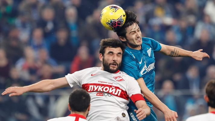 SAINT PETERSBURG, RUSSIA - DECEMBER 01: Sardar Azmoun (R) of FC Zenit Saint Petersburg and Georgi Dzhikiya of FC Spartak Moscow vie for a header during the Russian Premier League match between FC Zenit Saint Petersburg and FC Spartak Moscow on December 1, 2019 in Saint Petersburg, Russia. (Photo by Epsilon/Getty Images) SAINT PETERSBURG, RUSSIA - DECEMBER 01: Sardar Azmoun (R) of FC Zenit Saint Petersburg and Georgi Dzhikiya of FC Spartak Moscow vie for a header during the Russian Premier League match between FC Zenit Saint Petersburg and FC Spartak Moscow on December 1, 2019 in Saint Petersburg, Russia. (Photo by Epsilon/Getty Images)