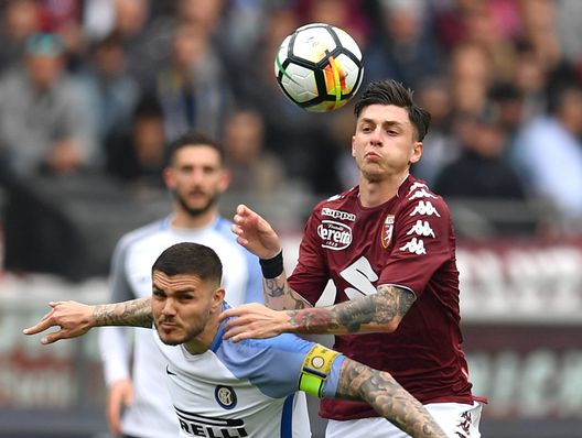 TURIN, ITALY - APRIL 08: Daniele Baselli (R) of Torino FC competes with Mauro Icardi of FC Internazionale during the Serie A match between Torino FC and FC Internazionale at Stadio Olimpico di Torino on April 8, 2018 in Turin, Italy. (Photo by Valerio Pennicino/Getty Images) TURIN, ITALY - APRIL 08: Daniele Baselli (R) of Torino FC competes with Mauro Icardi of FC Internazionale during the Serie A match between Torino FC and FC Internazionale at Stadio Olimpico di Torino on April 8, 2018 in Turin, Italy. (Photo by Valerio Pennicino/Getty Images)