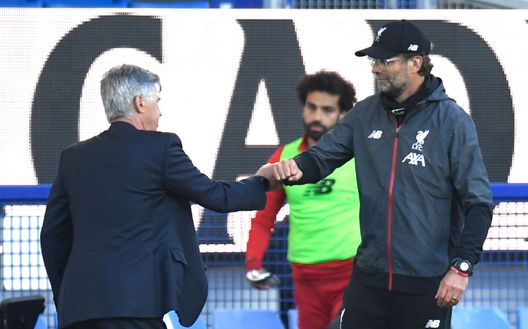 LIVERPOOL, ENGLAND - JUNE 21: Carlo Ancelotti, Manager of Everton interacts with Jurgen Klopp, Manager of Liverpool after the Premier League match between Everton FC and Liverpool FC at Goodison Park on June 21, 2020 in Liverpool, England. Football Stadiums around Europe remain empty due to the Coronavirus Pandemic as Government social distancing laws prohibit fans inside venues resulting in all fixtures being played behind closed doors. (Photo by Peter Powell/Pool via Getty Images) LIVERPOOL, ENGLAND - JUNE 21: Carlo Ancelotti, Manager of Everton interacts with Jurgen Klopp, Manager of Liverpool after the Premier League match between Everton FC and Liverpool FC at Goodison Park on June 21, 2020 in Liverpool, England. Football Stadiums around Europe remain empty due to the Coronavirus Pandemic as Government social distancing laws prohibit fans inside venues resulting in all fixtures being played behind closed doors. (Photo by Peter Powell/Pool via Getty Images)