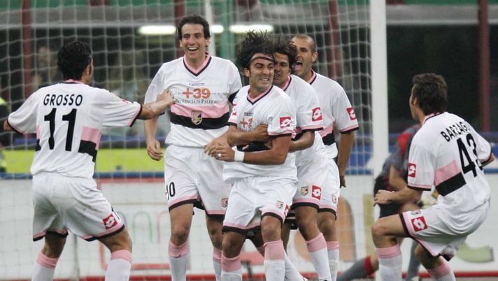 MILAN, ITALY - MAY 20:  Simone Barone of Palermo celebrates with team mates after scoring agaibst AC Milan during the Serie A game between AC Milan and Palermo  at the Guisseppe Meazza San Siro Stadium on May 20, 2005 in Milan, Italy. (Photo by New Press/Getty Images) 