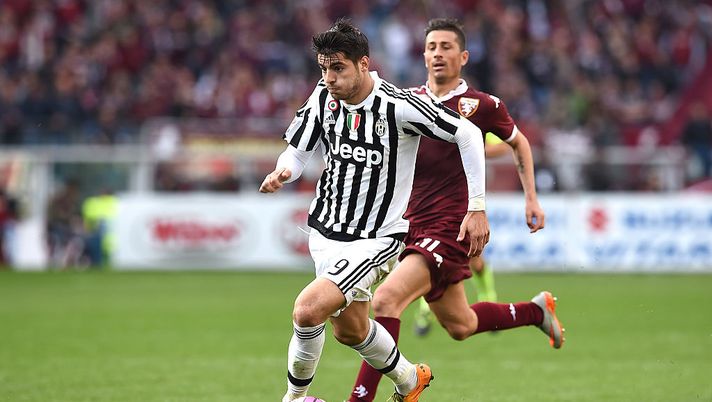 TURIN, ITALY - MARCH 20: Alvaro Morata (L) of Juventus FC in action against Giuseppe Vives of Torino FC during the Serie A match between Torino FC and Juventus FC at Stadio Olimpico di Torino on March 20, 2016 in Turin, Italy. (Photo by Valerio Pennicino/Getty Images) TURIN, ITALY - MARCH 20: Alvaro Morata (L) of Juventus FC in action against Giuseppe Vives of Torino FC during the Serie A match between Torino FC and Juventus FC at Stadio Olimpico di Torino on March 20, 2016 in Turin, Italy. (Photo by Valerio Pennicino/Getty Images)
