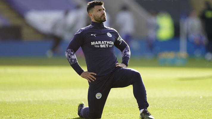 LEICESTER, ENGLAND - APRIL 03: Sergio Aguero of Manchester City warms up prior to during the Premier League match between Leicester City and Manchester City at The King Power Stadium on April 03, 2021 in Leicester, England. Sporting stadiums around the UK remain under strict restrictions due to the Coronavirus Pandemic as Government social distancing laws prohibit fans inside venues resulting in games being played behind closed doors. (Photo by Tim Keeton - Pool/Getty Images) LEICESTER, ENGLAND - APRIL 03: Sergio Aguero of Manchester City warms up prior to during the Premier League match between Leicester City and Manchester City at The King Power Stadium on April 03, 2021 in Leicester, England. Sporting stadiums around the UK remain under strict restrictions due to the Coronavirus Pandemic as Government social distancing laws prohibit fans inside venues resulting in games being played behind closed doors. (Photo by Tim Keeton - Pool/Getty Images)