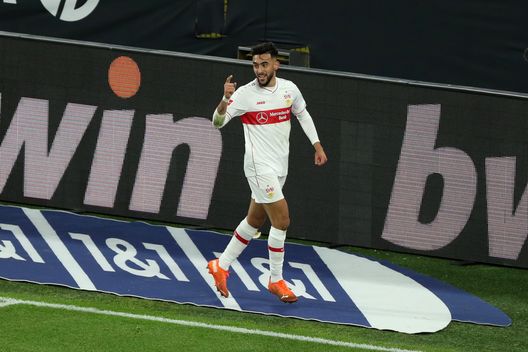 DORTMUND, GERMANY - DECEMBER 12: Nicolas Gonzalez of VfB Stuttgart celebrates after scoring his team's fifth goal during the Bundesliga match between Borussia Dortmund and VfB Stuttgart at Signal Iduna Park on December 12, 2020 in Dortmund, Germany. Sporting stadiums around Germany remain under strict restrictions due to the Coronavirus Pandemic as Government social distancing laws prohibit fans inside venues resulting in games being played behind closed doors. (Photo by Focke Strangmann - Pool/Getty Images) DORTMUND, GERMANY - DECEMBER 12: Nicolas Gonzalez of VfB Stuttgart celebrates after scoring his team's fifth goal during the Bundesliga match between Borussia Dortmund and VfB Stuttgart at Signal Iduna Park on December 12, 2020 in Dortmund, Germany. Sporting stadiums around Germany remain under strict restrictions due to the Coronavirus Pandemic as Government social distancing laws prohibit fans inside venues resulting in games being played behind closed doors. (Photo by Focke Strangmann - Pool/Getty Images)