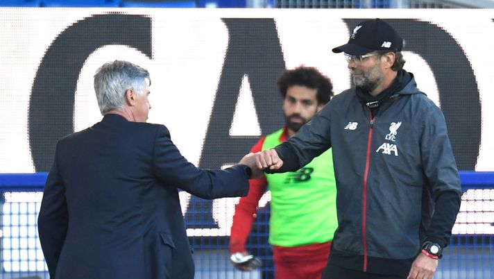 LIVERPOOL, ENGLAND - JUNE 21: Carlo Ancelotti, Manager of Everton interacts with Jurgen Klopp, Manager of Liverpool after the Premier League match between Everton FC and Liverpool FC at Goodison Park on June 21, 2020 in Liverpool, England. Football Stadiums around Europe remain empty due to the Coronavirus Pandemic as Government social distancing laws prohibit fans inside venues resulting in all fixtures being played behind closed doors. (Photo by Peter Powell/Pool via Getty Images) LIVERPOOL, ENGLAND - JUNE 21: Carlo Ancelotti, Manager of Everton interacts with Jurgen Klopp, Manager of Liverpool after the Premier League match between Everton FC and Liverpool FC at Goodison Park on June 21, 2020 in Liverpool, England. Football Stadiums around Europe remain empty due to the Coronavirus Pandemic as Government social distancing laws prohibit fans inside venues resulting in all fixtures being played behind closed doors. (Photo by Peter Powell/Pool via Getty Images)
