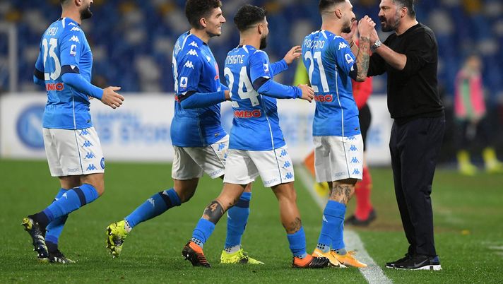 NAPLES, ITALY - JANUARY 31: Matteo Politano of SSC Napoli celebrates with Gennaro Gattuso, head coach of Napoli and team mates after scoring their side's second goal during the Serie A match between SSC Napoli and Parma Calcio at Stadio Diego Armando Maradona on January 31, 2021 in Naples, Italy. Sporting stadiums around Italy remain under strict restrictions due to the Coronavirus Pandemic as Government social distancing laws prohibit fans inside venues resulting in games being played behind closed doors. (Photo by Francesco Pecoraro/Getty Images ) NAPLES, ITALY - JANUARY 31: Matteo Politano of SSC Napoli celebrates with Gennaro Gattuso, head coach of Napoli and team mates after scoring their side's second goal during the Serie A match between SSC Napoli and Parma Calcio at Stadio Diego Armando Maradona on January 31, 2021 in Naples, Italy. Sporting stadiums around Italy remain under strict restrictions due to the Coronavirus Pandemic as Government social distancing laws prohibit fans inside venues resulting in games being played behind closed doors. (Photo by Francesco Pecoraro/Getty Images )
