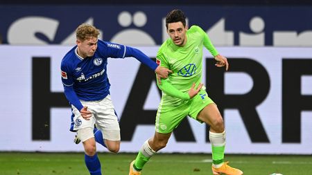 GELSENKIRCHEN, GERMANY - NOVEMBER 21: Kilian Ludewig of FC Schalke 04 battles for possession with Josip Brekalo of VfL Wolfsburg during the Bundesliga match between FC Schalke 04 and VfL Wolfsburg at Veltins-Arena on November 21, 2020 in Gelsenkirchen, Germany. Football Stadiums around Europe remain empty due to the Coronavirus Pandemic as Government social distancing laws prohibit fans inside venues resulting in fixtures being played behind closed doors. (Photo by Sascha Steinbach - Pool/Getty Images) GELSENKIRCHEN, GERMANY - NOVEMBER 21: Kilian Ludewig of FC Schalke 04 battles for possession with Josip Brekalo of VfL Wolfsburg during the Bundesliga match between FC Schalke 04 and VfL Wolfsburg at Veltins-Arena on November 21, 2020 in Gelsenkirchen, Germany. Football Stadiums around Europe remain empty due to the Coronavirus Pandemic as Government social distancing laws prohibit fans inside venues resulting in fixtures being played behind closed doors. (Photo by Sascha Steinbach - Pool/Getty Images)