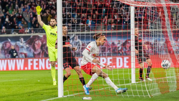 LEIPZIG, GERMANY - DECEMBER 21: Yussuf Poulsen of RB Leipzig takes the ball out of the net after scoring his team's third goal during the Bundesliga match between RB Leipzig and FC Augsburg at Red Bull Arena on December 21, 2019 in Leipzig, Germany. (Photo by Boris Streubel/Bongarts/Getty Images) LEIPZIG, GERMANY - DECEMBER 21: Yussuf Poulsen of RB Leipzig takes the ball out of the net after scoring his team's third goal during the Bundesliga match between RB Leipzig and FC Augsburg at Red Bull Arena on December 21, 2019 in Leipzig, Germany. (Photo by Boris Streubel/Bongarts/Getty Images)
