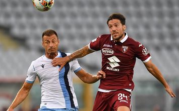  TURIN, ITALY - JUNE 30: Simone Verdi (R) of Torino FC is challenged by Stefan Radu of SS Lazio during the Serie A match between Torino FC and SS Lazio at Stadio Olimpico di Torino on June 30, 2020 in Turin, Italy. (Photo by Valerio Pennicino/Getty Images)