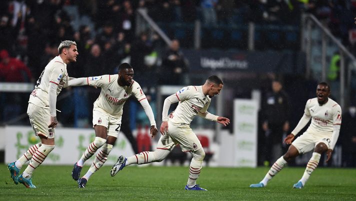 CAGLIARI, ITALY - MARCH 19: Ismael Bennacer of AC Milan celebrates with team-mates after scoring the opening goal during the Serie A match between Cagliari Calcio and AC Milan at Sardegna Arena on March 19, 2022 in Cagliari, Italy. (Photo by Claudio Villa/AC Milan via Getty Images)