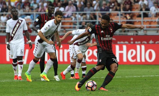 MILAN, ITALY - AUGUST 21: Carlos Bacca of AC Milan scores his third goal from the penalty spot during the Serie A match between AC Milan and FC Torino at Stadio Giuseppe Meazza on August 21, 2016 in Milan, Italy. (Photo by Marco Luzzani/Getty Images) MILAN, ITALY - AUGUST 21: Carlos Bacca of AC Milan scores his third goal from the penalty spot during the Serie A match between AC Milan and FC Torino at Stadio Giuseppe Meazza on August 21, 2016 in Milan, Italy. (Photo by Marco Luzzani/Getty Images)