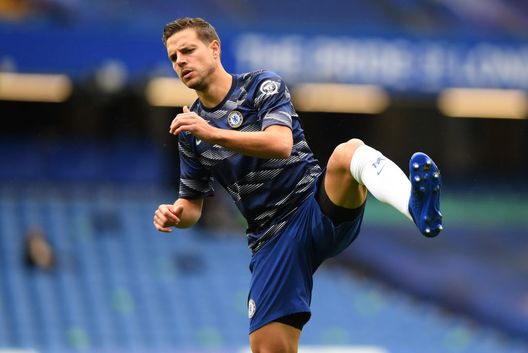 LONDON, ENGLAND - OCTOBER 03: Cesar Azpilicueta of Chelsea warms up prior to the Premier League match between Chelsea and Crystal Palace at Stamford Bridge on October 03, 2020 in London, England. Sporting stadiums around the UK remain under strict restrictions due to the Coronavirus Pandemic as Government social distancing laws prohibit fans inside venues resulting in games being played behind closed doors. (Photo by Mike Hewitt/Getty Images) LONDON, ENGLAND - OCTOBER 03: Cesar Azpilicueta of Chelsea warms up prior to the Premier League match between Chelsea and Crystal Palace at Stamford Bridge on October 03, 2020 in London, England. Sporting stadiums around the UK remain under strict restrictions due to the Coronavirus Pandemic as Government social distancing laws prohibit fans inside venues resulting in games being played behind closed doors. (Photo by Mike Hewitt/Getty Images)