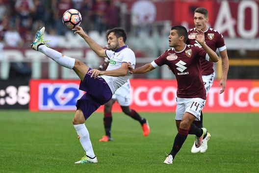 TURIN, ITALY - OCTOBER 02: Iago Falque (R) of FC Torino competes with Hrvoje Milic of ACF Fiorentina during the Serie A match between FC Torino and ACF Fiorentina at Stadio Olimpico di Torino on October 2, 2016 in Turin, Italy. (Photo by Valerio Pennicino/Getty Images) TURIN, ITALY - OCTOBER 02: Iago Falque (R) of FC Torino competes with Hrvoje Milic of ACF Fiorentina during the Serie A match between FC Torino and ACF Fiorentina at Stadio Olimpico di Torino on October 2, 2016 in Turin, Italy. (Photo by Valerio Pennicino/Getty Images)