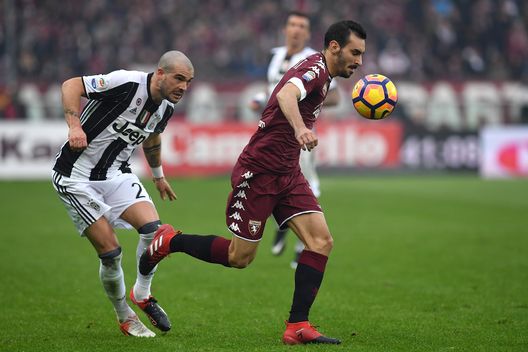 TURIN, ITALY - DECEMBER 11: Davide Zappacosta (R) of FC Torino in action against Stefano Sturaro of Juventus FC during the Serie A match between FC Torino and Juventus FC at Stadio Olimpico di Torino on December 11, 2016 in Turin, Italy. (Photo by Valerio Pennicino/Getty Images) TURIN, ITALY - DECEMBER 11: Davide Zappacosta (R) of FC Torino in action against Stefano Sturaro of Juventus FC during the Serie A match between FC Torino and Juventus FC at Stadio Olimpico di Torino on December 11, 2016 in Turin, Italy. (Photo by Valerio Pennicino/Getty Images)