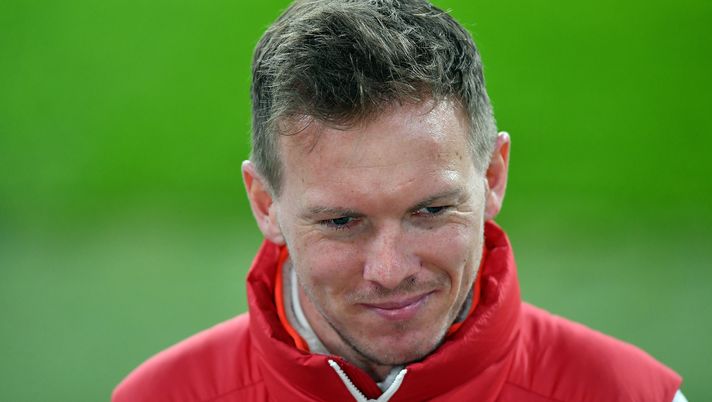LEIPZIG, GERMANY - MARCH 03: Julian Nagelsmann, Head Coach of RB Leipzig speaks during a TV Interview prior to the DFB Cup quarter final match between RB Leipzig and VfL Wolfsburg at Red Bull Arena on March 03, 2021 in Leipzig, Germany. Sporting stadiums around Germany remain under strict restrictions due to the Coronavirus Pandemic as Government social distancing laws prohibit fans inside venues resulting in games being played behind closed doors. (Photo by Stuart Franklin/Getty Images) Nagelsmann: “Quando perdo mi vergogno. La notte urlo i nomi dei calciatori, me l’ha detto mia moglie…” - immagine 1