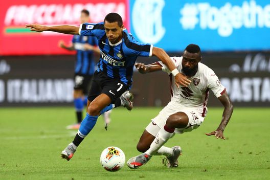 MILAN, ITALY - JULY 13: Alexis Sanchez of FC Internazionale competes for the ball with Nicolas Nkoulou of Torino FC during the Serie A match between FC Internazionale and Torino FC at Stadio Giuseppe Meazza on July 13, 2020 in Milan, Italy. (Photo by Marco Luzzani/Getty Images) MILAN, ITALY - JULY 13: Alexis Sanchez of FC Internazionale competes for the ball with Nicolas Nkoulou of Torino FC during the Serie A match between FC Internazionale and Torino FC at Stadio Giuseppe Meazza on July 13, 2020 in Milan, Italy. (Photo by Marco Luzzani/Getty Images)