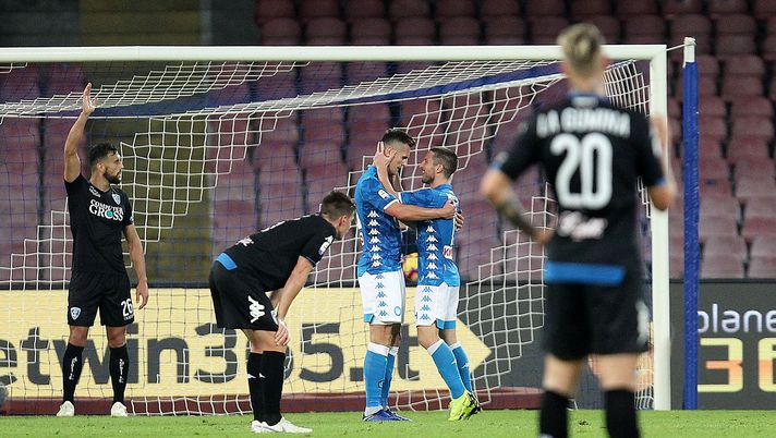NAPLES, ITALY - NOVEMBER 02: Dries Mertens and Arkadiusz Milik of SSC Napoli celebrate after scoring the 4-1 goal, beside the disappointment of players of Empoli during the Serie A match between SSC Napoli and Empoli at Stadio San Paolo on November 2, 2018 in Naples, Italy. (Photo by Francesco Pecoraro/Getty Images) NAPLES, ITALY - NOVEMBER 02: Dries Mertens and Arkadiusz Milik of SSC Napoli celebrate after scoring the 4-1 goal, beside the disappointment of players of Empoli during the Serie A match between SSC Napoli and Empoli at Stadio San Paolo on November 2, 2018 in Naples, Italy. (Photo by Francesco Pecoraro/Getty Images)