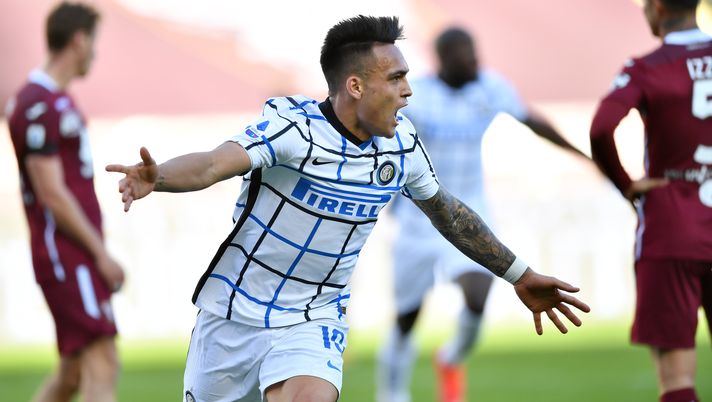 TURIN, ITALY - MARCH 14: Lautaro Martinez of Internazionale celebrates after scoring their side's second goal during the Serie A match between Torino FC and FC Internazionale at Stadio Olimpico di Torino on March 14, 2021 in Turin, Italy. Sporting stadiums around Italy remain under strict restrictions due to the Coronavirus Pandemic as Government social distancing laws prohibit fans inside venues resulting in games being played behind closed doors. (Photo by Valerio Pennicino/Getty Images) TURIN, ITALY - MARCH 14: Lautaro Martinez of Internazionale celebrates after scoring their side's second goal during the Serie A match between Torino FC and FC Internazionale at Stadio Olimpico di Torino on March 14, 2021 in Turin, Italy. Sporting stadiums around Italy remain under strict restrictions due to the Coronavirus Pandemic as Government social distancing laws prohibit fans inside venues resulting in games being played behind closed doors. (Photo by Valerio Pennicino/Getty Images)