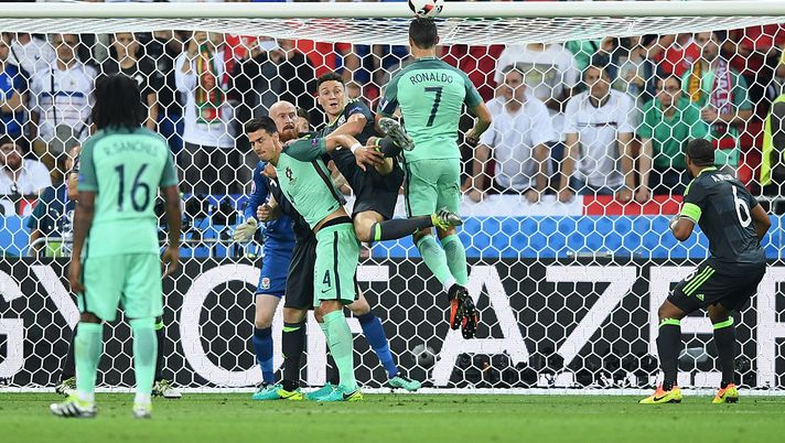 JULY 06:  Cristiano Ronaldo stacca di testa contro il Galles  