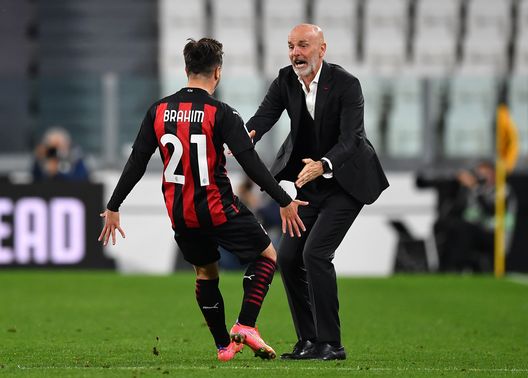 TURIN, ITALY - MAY 09: Brahim Diaz of A.C. Milan celebrates with Stefano Pioli after scoring their side's first goal during the Serie A match between Juventus and AC Milan at on May 09, 2021 in Turin, Italy. Sporting stadiums around Italy remain under strict restrictions due to the Coronavirus Pandemic as Government social distancing laws prohibit fans inside venues resulting in games being played behind closed doors. (Photo by Valerio Pennicino/Getty Images) TURIN, ITALY - MAY 09: Brahim Diaz of A.C. Milan celebrates with Stefano Pioli after scoring their side's first goal during the Serie A match between Juventus and AC Milan at on May 09, 2021 in Turin, Italy. Sporting stadiums around Italy remain under strict restrictions due to the Coronavirus Pandemic as Government social distancing laws prohibit fans inside venues resulting in games being played behind closed doors. (Photo by Valerio Pennicino/Getty Images)