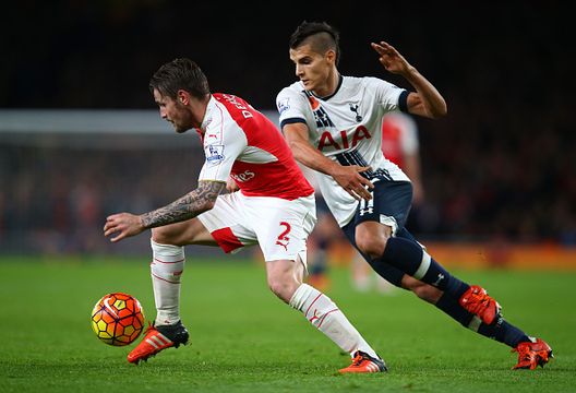 LONDON, ENGLAND - NOVEMBER 08: Mathieu Debuchy of Arsenal holds off Erik Lamela of Spurs during the Barclays Premier League match between Arsenal and Tottenham Hotspur at the Emirates Stadium on November 8, 2015 in London, England. (Photo by Clive Rose/Getty Images) LONDON, ENGLAND - NOVEMBER 08: Mathieu Debuchy of Arsenal holds off Erik Lamela of Spurs during the Barclays Premier League match between Arsenal and Tottenham Hotspur at the Emirates Stadium on November 8, 2015 in London, England. (Photo by Clive Rose/Getty Images)