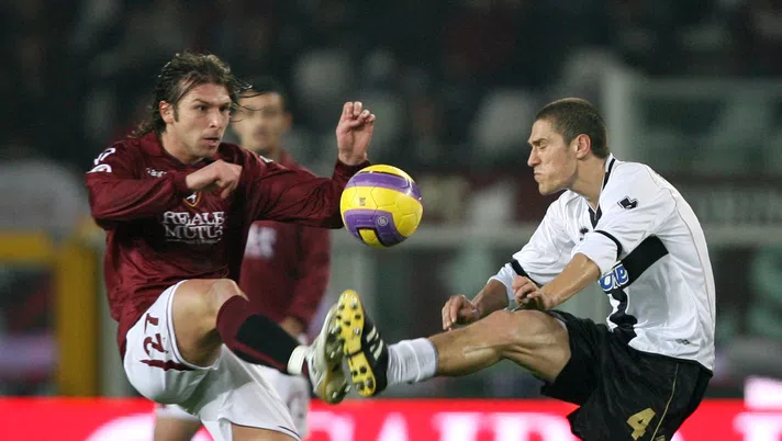 TURIN, ITALY - FEBRUARY 23:  Paolo Zanetti of Torino and Stefano Morrone of Parma during the Serie A match between Torino and Parma at the Stadio Olimpico on February 23, 2008 in Turin, Italy. (Photo by New Press/Getty Images)