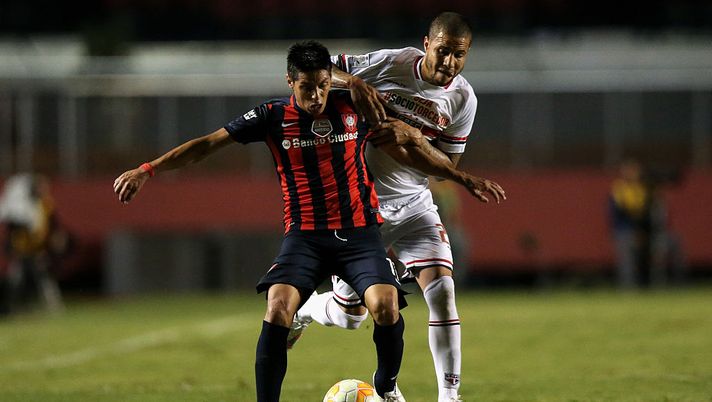 SAO PAULO, BRAZIL - MARCH 18: Pablo Barrientos of San Lorenzo batt;es for the ball with Bruno of Sao Paulo during a match between Sao Paulo and San Lorenzo as part of Group 2 of Copa Bridgestone Libertadores at Morumbi Stadium on March 18, 2015 in Sao Paulo, Brazil. (Photo by Friedemann Vogel/Getty Images) SAO PAULO, BRAZIL - MARCH 18: Pablo Barrientos of San Lorenzo batt;es for the ball with Bruno of Sao Paulo during a match between Sao Paulo and San Lorenzo as part of Group 2 of Copa Bridgestone Libertadores at Morumbi Stadium on March 18, 2015 in Sao Paulo, Brazil. (Photo by Friedemann Vogel/Getty Images)