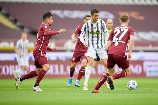 TURIN, ITALY - APRIL 03: Cristiano Ronaldo of Juventus competes for the ball with Mergim Vojvoda of Torino FC during the Serie A match between Torino FC and Juventus at Stadio Olimpico di Torino on April 03, 2021 in Turin, Italy. Sporting stadiums around Italy remain under strict restrictions due to the Coronavirus Pandemic as Government social distancing laws prohibit fans inside venues resulting in games being played behind closed doors. (Photo by Daniele Badolato - Juventus FC/Juventus FC via Getty Images) TURIN, ITALY - APRIL 03: Cristiano Ronaldo of Juventus competes for the ball with Mergim Vojvoda of Torino FC during the Serie A match between Torino FC and Juventus at Stadio Olimpico di Torino on April 03, 2021 in Turin, Italy. Sporting stadiums around Italy remain under strict restrictions due to the Coronavirus Pandemic as Government social distancing laws prohibit fans inside venues resulting in games being played behind closed doors. (Photo by Daniele Badolato - Juventus FC/Juventus FC via Getty Images)