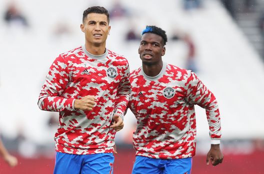LONDON, ENGLAND - SEPTEMBER 19: Cristiano Ronaldo of Manchester United is seen warming up with Paul Pogba of Manchester United prior to the Premier League match between West Ham United and Manchester United at London Stadium on September 19, 2021 in London, England. (Photo by Julian Finney/Getty Images) LONDON, ENGLAND - SEPTEMBER 19: Cristiano Ronaldo of Manchester United is seen warming up with Paul Pogba of Manchester United prior to the Premier League match between West Ham United and Manchester United at London Stadium on September 19, 2021 in London, England. (Photo by Julian Finney/Getty Images)