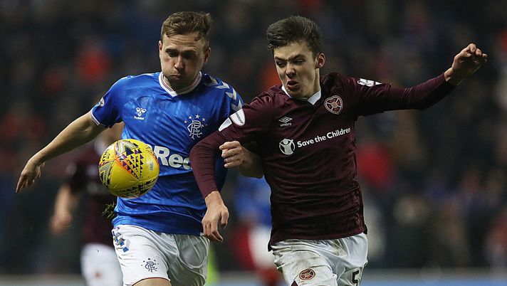 GLASGOW, SCOTLAND - DECEMBER 01: Greg Stewart of Rangers vies with Aaron Hickey of Heart of Midlothian during the Ladbrokes Premiership match between Rangers and Hearts at Ibrox Stadium on December 01, 2019 in Glasgow, Scotland. (Photo by Ian MacNicol/Getty Images) 