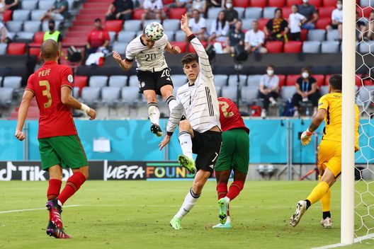 MUNICH, GERMANY - JUNE 19: Robin Gosens of Germany scores their side's fourth goal past Rui Patricio of Portugal during the UEFA Euro 2020 Championship Group F match between Portugal and Germany at Football Arena Munich on June 19, 2021 in Munich, Germany. (Photo by Kai Pfaffenbach - Pool/Getty Images) MUNICH, GERMANY - JUNE 19: Robin Gosens of Germany scores their side's fourth goal past Rui Patricio of Portugal during the UEFA Euro 2020 Championship Group F match between Portugal and Germany at Football Arena Munich on June 19, 2021 in Munich, Germany. (Photo by Kai Pfaffenbach - Pool/Getty Images)
