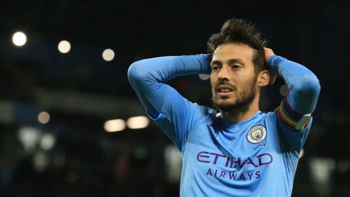Manchester City's Spanish midfielder David Silva reacts after a missed chance during the English Premier League football match between Manchester City and Manchester United at the Etihad Stadium in Manchester, north west England, on December 7, 2019. (Photo by Lindsey Parnaby / AFP) / RESTRICTED TO EDITORIAL USE. No use with unauthorized audio, video, data, fixture lists, club/league logos or 'live' services. Online in-match use limited to 120 images. An additional 40 images may be used in extra time. No video emulation. Social media in-match use limited to 120 images. An additional 40 images may be used in extra time. No use in betting publications, games or single club/league/player publications. / (Photo by LINDSEY PARNABY/AFP via Getty Images) I 10 milioni, un jet, la sparizione, la Juve, il motivo della rottura: David Silva e la Lazio, cos’è successo- immagine 1