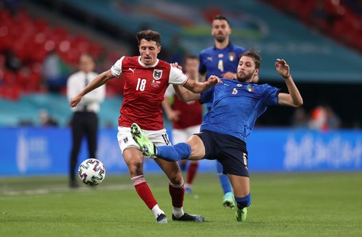 LONDON, ENGLAND - JUNE 26: Alessandro Schoepf of Austria is challenged by Manuel Locatelli of Italy during the UEFA Euro 2020 Championship Round of 16 match between Italy and Austria at Wembley Stadium at Wembley Stadium on June 26, 2021 in London, England. (Photo by Catherine Ivill/Getty Images) LONDON, ENGLAND - JUNE 26: Alessandro Schoepf of Austria is challenged by Manuel Locatelli of Italy during the UEFA Euro 2020 Championship Round of 16 match between Italy and Austria at Wembley Stadium at Wembley Stadium on June 26, 2021 in London, England. (Photo by Catherine Ivill/Getty Images)