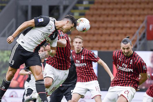 MILAN, ITALY - JULY 07: Juventus player Cristiano Ronaldo and Milan player Zlatan Ibrahimovic during the Serie A match between AC Milan and Juventus at Stadio Giuseppe Meazza on July 07, 2020 in Milan, Italy. (Photo by Daniele Badolato - Juventus FC/Juventus FC via Getty Images) MILAN, ITALY - JULY 07: Juventus player Cristiano Ronaldo and Milan player Zlatan Ibrahimovic during the Serie A match between AC Milan and Juventus at Stadio Giuseppe Meazza on July 07, 2020 in Milan, Italy. (Photo by Daniele Badolato - Juventus FC/Juventus FC via Getty Images)